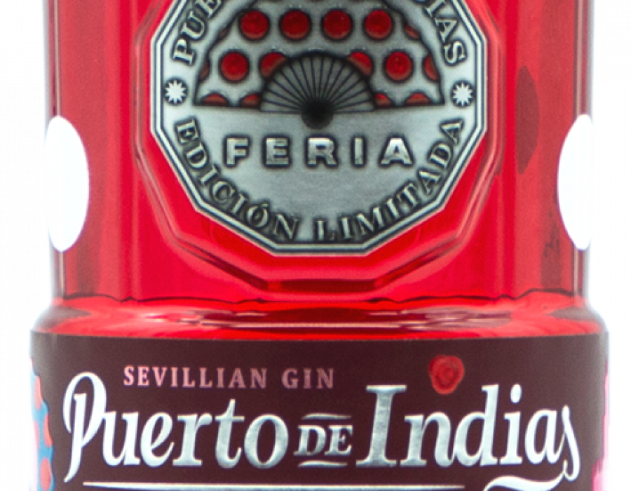 La botella de Edición Especial vestida de flamenca con los colores rojo clavel y lunares blancos.