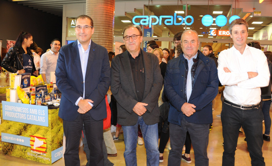 El Director Comercial de Caprabo, Josep Barceló, el Director General de Alimentación, Calidad e Industrias Alimentarias de la Generalitat de Catalunya, Carmel Mòdol, el presidente de la Federació 