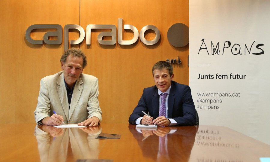 En la imagen, el director general de Ampans, Toni Espinal, y el director general de Caprabo, Martin Gandiaga.