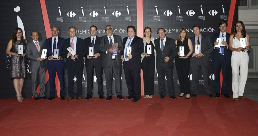 Los galardonados con sus respectivos premios.